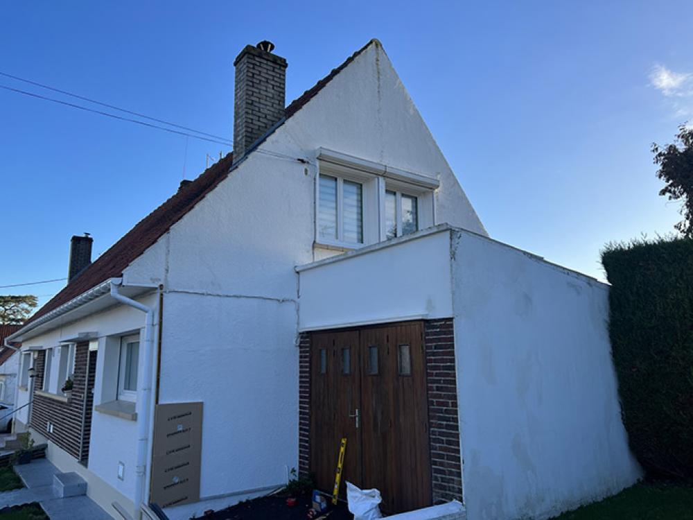 Pose de panneaux d'isolation sur façade (62)